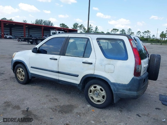 2005 Honda CR-V LX with VIN JHLRD68565C005484, listed as a IAAI auction lot 41983513 with 215,839 mi miles. Bid and sale history available at carsss.com. Image 3.