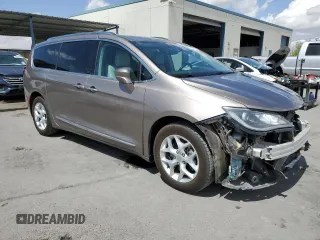 2017 Chrysler Pacifica Touring L Plus with VIN 2C4RC1EG8HR721033, listed as a Copart auction lot 52007375 with 85,287 mi miles and Salvage Title. Bid and sale history available at DreamBid. Image 4.