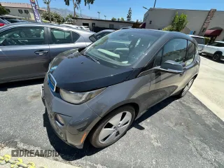2014 BMW i3 with VIN WBY1Z4C51EV274633, listed as a Copart auction lot 64677185 with 61,664 mi miles and Clean title. Bid and sale history available at DreamBid. Image 2.