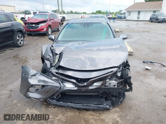 2023 Toyota Camry SE z VIN 4T1T11AK8PU802097, wystawiony jako IAAI lot #42389754 z przebiegiem 19 732 mil mil oraz . Historia ofert i sprzedaży dostępna na DreamBid. Obrazek 12.