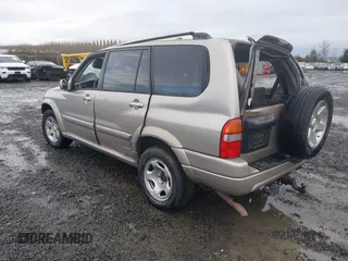 2001 Suzuki XL7 Standard z VIN JS3TX92VX14114699, wystawiony jako IAAI lot #41085552 z przebiegiem 195 316 mil mil oraz . Historia ofert i sprzedaży dostępna na DreamBid. Obrazek 3.