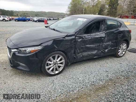 2017 Mazda 3 Touring z VIN JM1BN1L76H1111649, wystawiony jako Copart lot #51713185 z przebiegiem 104 749 mil mil oraz Szkoda całkowita • Salvage title. Historia ofert i sprzedaży dostępna na DreamBid. Obrazek 1.