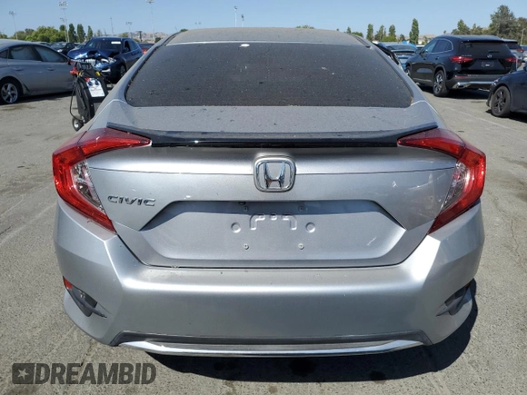 2020 Honda Civic LX z VIN 19XFC2F6XLE209685, wystawiony jako Copart lot #59595335 z przebiegiem Nie podano mil oraz Szkoda całkowita • Salvage title. Historia ofert i sprzedaży dostępna na DreamBid. Obrazek 6.