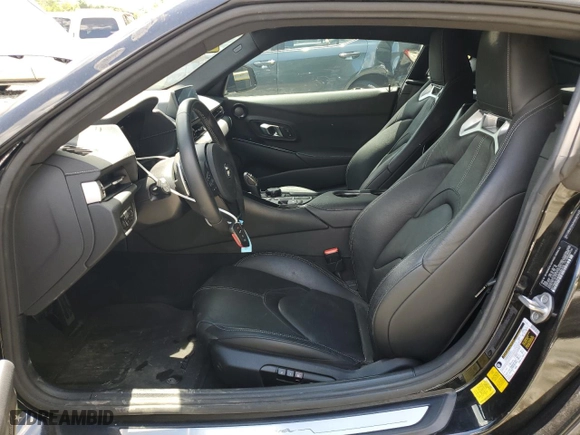 2021 Toyota GR Supra 3.0 with VIN WZ1DB0C04MW035703, listed as a Copart auction lot 61306374 with 46,176 mi miles and Salvage Title. Bid and sale history available at carsss.com. Image 7.