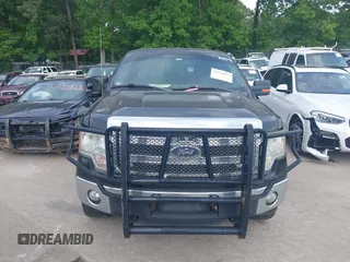 2014 Ford F-150 XL with VIN 1FTFX1EF0EKG08427, listed as a IAAI auction lot 42127077 with 203,377 mi miles. Bid and sale history available at carsss.com. Image 12.