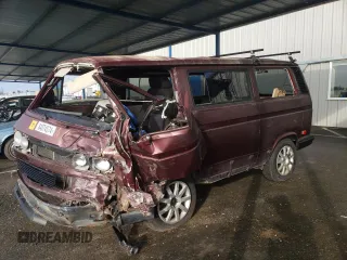1991 Volkswagen Vanagon with VIN WV2YB0254MG012768, listed as a Copart auction lot 84074574 with Not Provided miles and Salvage Title. Bid and sale history available at DreamBid. Image 1.