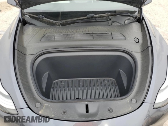 2022 Tesla Model Y Long Range with VIN 7SAYGDEE1NF315198, listed as a Copart auction lot 50399005 with 33,357 mi miles and Salvage Title. Bid and sale history available at DreamBid. Image 12.