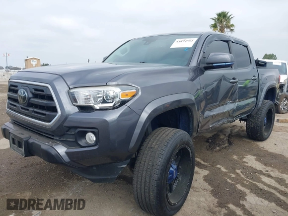 2018 Toyota Tacoma SR5 with VIN 5TFAZ5CNXJX066952, listed as a IAAI auction lot 41894562 with 141,818 mi miles and . Bid and sale history available at DreamBid. Image 17.