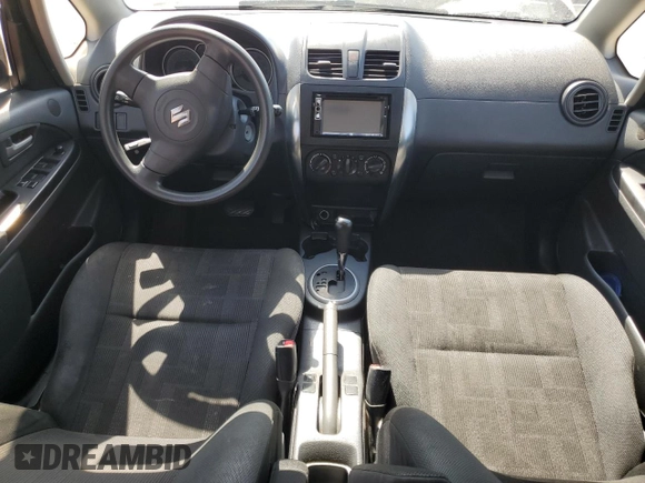 2010 Suzuki SX4 z VIN JS2YA5A32A6300486, wystawiony jako Copart lot #52340575 z przebiegiem 200 190 mil mil oraz Szkody całkowita. Historia ofert i sprzedaży dostępna na DreamBid. Obrazek 8.