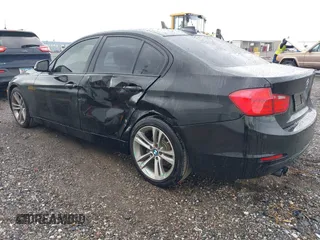 2013 BMW 3 Series 328i with VIN WBA3A5C56DF453232, listed as a IAAI auction lot 41794450 with 152,304 mi miles. Bid and sale history available at carsss.com. Image 3.