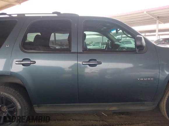 2009 Chevrolet Tahoe 2LT z VIN 1GNFK23069R293642, wystawiony jako IAAI lot #41584582 z przebiegiem 140 633 mil mil oraz . Historia ofert i sprzedaży dostępna na DreamBid. Obrazek 13.