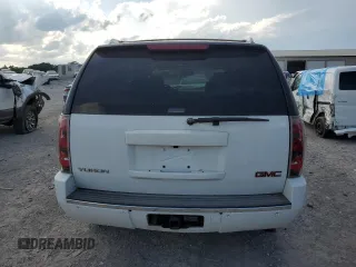 2007 GMC Yukon Denali z VIN 1GKFK63877J383310, wystawiony jako Copart lot #56122105 z przebiegiem 250 797 mil mil oraz Czysty tytuł • Clean title. Historia ofert i sprzedaży dostępna na DreamBid. Obrazek 6.