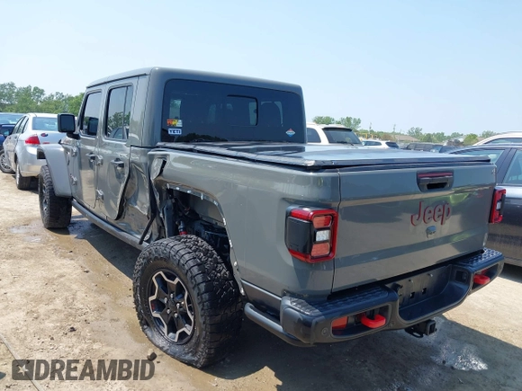 2021 Jeep Gladiator Rubicon with VIN 1C6JJTBG2ML515932, listed as a IAAI auction lot 42471704 with 57,775 mi miles and . Bid and sale history available at DreamBid. Image 3.
