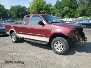 1998 Ford F-150 with VIN 1FTZX18W8WNB76999, listed as a Copart auction lot 59845595 with 135,063 mi miles and Salvage title. Bid and sale history available at DreamBid. Image 4.