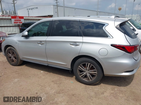 2019 Infiniti QX60 Luxe with VIN 5N1DL0MN0KC511333, listed as a IAAI auction lot 42070088 with 117,796 mi miles and . Bid and sale history available at DreamBid. Image 14.