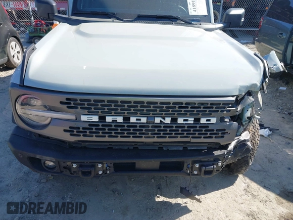 2023 Ford Bronco z VIN 1FMEE5DP7PLB81565, wystawiony jako IAAI lot #41891295 z przebiegiem 27 890 mil mil oraz . Historia ofert i sprzedaży dostępna na DreamBid. Obrazek 12.