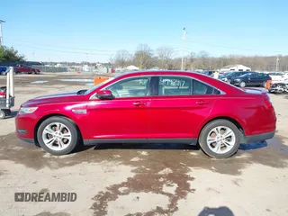 2013 Ford Taurus SEL with VIN 1FAHP2E87DG168603, listed as a IAAI auction lot 41942917 with 161,293 mi miles. Bid and sale history available at carsss.com. Image 13.