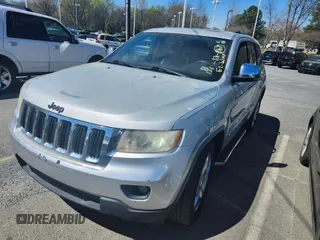 2012 Jeep Grand Cherokee Limited with VIN 1C4RJEBT0CC204468, listed as a IAAI auction lot 41928858 with 167,643 mi miles. Bid and sale history available at carsss.com. Image 2.