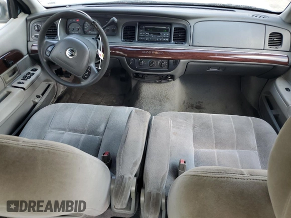 2004 Mercury Grand Marquis GS z VIN 2MEFM74W84X607050, wystawiony jako Copart lot #52303045 z przebiegiem 194 215 mil mil oraz Szkoda całkowita • Salvage title. Historia ofert i sprzedaży dostępna na DreamBid. Obrazek 8.