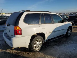 2005 GMC Envoy SLT with VIN 1GKDT13S452369908, listed as a Copart auction lot 49643375 with 0 mi miles and Salvage Title. Bid and sale history available at carsss.com. Image 3.