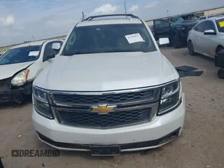 2016 Chevrolet Suburban LT with VIN 1GNSCHKC9GR273201, listed as a IAAI auction lot 41743971 with 180,945 mi miles. Bid and sale history available at carsss.com. Image 12.