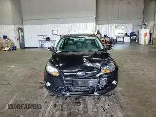 2014 Ford Focus Titanium with VIN 1FADP3N2XEL131392, listed as a Copart auction lot 61665025 with 105,597 mi miles and Salvage title. Bid and sale history available at DreamBid. Image 13.