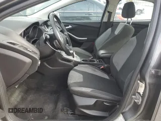 2012 Ford Focus SE with VIN 1FAHP3F27CL335046, listed as a Copart auction lot 55235175 with 128,119 mi miles and Salvage title. Bid and sale history available at DreamBid. Image 7.