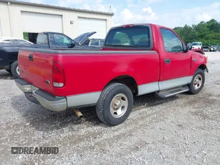 2000 Ford F-150 XL with VIN 1FTZF1720YNB66858, listed as a IAAI auction lot 42302193 with Not provided miles and . Bid and sale history available at DreamBid. Image 4.