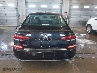 2022 Volkswagen Passat 2.0T SE with VIN 1VWSA7A31NC003418, listed as a IAAI auction lot 41608219 with 76,591 mi miles. Bid and sale history available at carsss.com. Image 16.