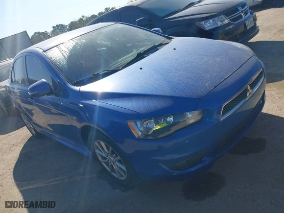 2015 Mitsubishi Lancer ES with VIN JA32U2FU0FU012412, listed as a IAAI auction lot 41766999 with 158,851 mi miles. Bid and sale history available at carsss.com. Image 1.