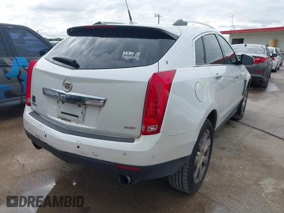 2013 Cadillac SRX Performance Collection z VIN 3GYFNDE38DS542736, wystawiony jako IAAI lot #42398648 z przebiegiem 266 059 mil mil oraz . Historia ofert i sprzedaży dostępna na DreamBid. Obrazek 4.