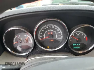 2010 Dodge Caliber Mainstreet z VIN 1B3CB3HA5AD591279, wystawiony jako Copart lot #57794645 z przebiegiem 200 007 mil mil oraz Szkoda całkowita • Salvage title. Historia ofert i sprzedaży dostępna na DreamBid. Obrazek 9.