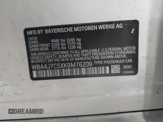 2019 BMW 4 Series 440i xDrive with VIN WBA4J7C5XKBM76209, listed as a IAAI auction lot 42071170 with 62,460 mi miles and . Bid and sale history available at carsss.com. Image 9.