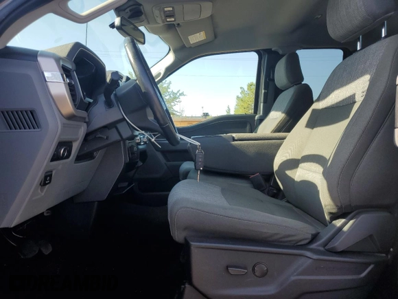 2022 Ford F-150 XL with VIN 1FTFX1E58NFB61927, listed as a Copart auction lot 55233035 with 66,591 mi miles and Salvage title. Bid and sale history available at DreamBid. Image 7.