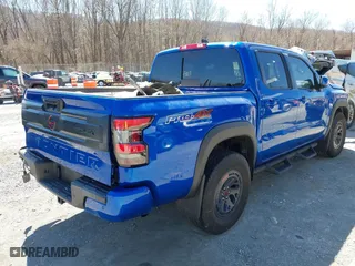 2025 Nissan Frontier PRO-4X with VIN 1N6ED1EK0SN614348, listed as a IAAI auction lot 41826627 with 6,931 mi miles. Bid and sale history available at carsss.com. Image 4.