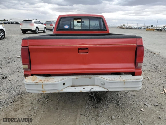 1988 GMC S15 with VIN 1GTBS14E2J2539806, listed as a Copart auction lot 71105184 with 141085 miles and Salvage Title. Bid and sale history available at carsss.com. Image 6.