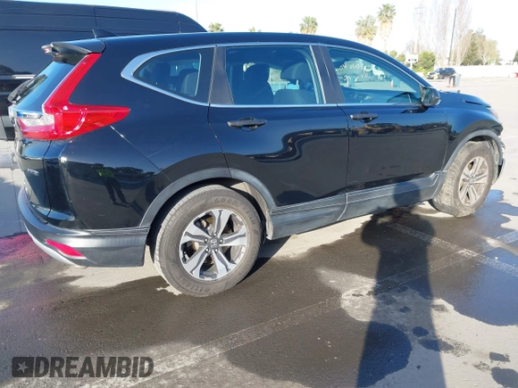2019 Honda CR-V LX with VIN 5J6RW6H30KL000065, listed as a IAAI auction lot 41954117 with 111,872 mi miles. Bid and sale history available at carsss.com. Image 4.