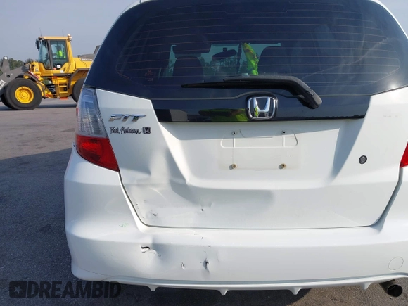 2010 Honda Fit with VIN JHMGE8H22AS022221, listed as a IAAI auction lot 42009796 with 101,904 mi miles. Bid and sale history available at carsss.com. Image 6.