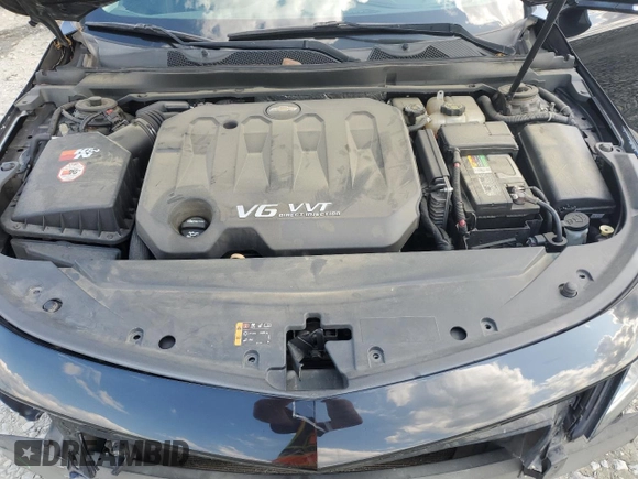 2015 Chevrolet Impala LT z VIN 1G1125S38FU144215, wystawiony jako Copart lot #57964915 z przebiegiem 125 922 mil mil oraz Szkoda całkowita • Salvage title. Historia ofert i sprzedaży dostępna na DreamBid. Obrazek 11.