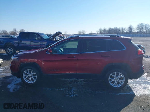 2015 Jeep Cherokee Latitude with VIN 1C4PJLCB4FW730607, listed as a IAAI auction lot 41738845 with 202,216 mi miles and . Bid and sale history available at DreamBid. Image 14.
