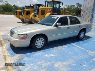 2005 Mercury Grand Marquis LS Premium z VIN 2MEFM75W45X636559, wystawiony jako Copart lot #54424415 z przebiegiem 129 643 mil mil oraz Szkody całkowita. Historia ofert i sprzedaży dostępna na DreamBid. Obrazek 1.
