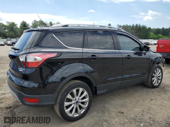 2017 Ford Escape Titanium with VIN 1FMCU9J9XHUD30408, listed as a Copart auction lot 58393844 with 81,779 mi miles and Salvage Title. Bid and sale history available at carsss.com. Image 3.
