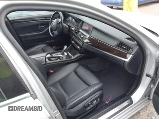 2015 BMW 5 Series 535i xDrive with VIN WBA5B3C54FD544802, listed as a IAAI auction lot 41283822 with 93,828 mi miles. Bid and sale history available at carsss.com. Image 5.