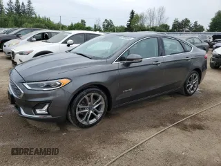 2019 Ford Fusion Titanium with VIN 3FA6P0RU5KR191273, listed as a Copart auction lot 63880085 with 103,914 mi miles and Clean title. Bid and sale history available at DreamBid. Image 1.