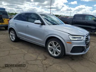 2017 Audi Q3 Prestige z VIN WA1GCCFS0HR005569, wystawiony jako Copart lot #57902185 z przebiegiem 89 900 mil mil oraz Szkody całkowita. Historia ofert i sprzedaży dostępna na DreamBid. Obrazek 4.