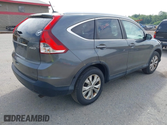 2012 Honda CR-V EX-L with VIN 2HKRM4H73CH634074, listed as a IAAI auction lot 42611285 with 299,348 mi miles and . Bid and sale history available at DreamBid. Image 4.