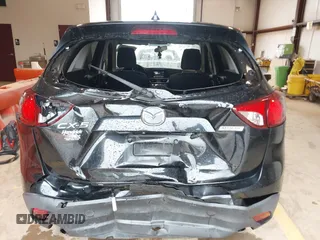 2016 Mazda CX-5 Touring with VIN JM3KE2CY7G0867355, listed as a IAAI auction lot 41963169 with 117,727 mi miles and . Bid and sale history available at DreamBid. Image 16.
