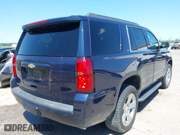 2018 Chevrolet Tahoe LT with VIN 1GNSCBKC0JR138385, listed as a IAAI auction lot 41977300 with 104,987 mi miles and . Bid and sale history available at DreamBid. Image 4.