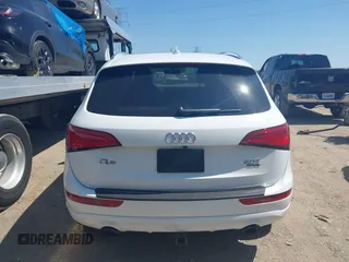 2016 Audi Q5 Premium z VIN WA1C2AFP9GA124543, wystawiony jako IAAI lot #42230182 z przebiegiem 80 722 mil mil oraz . Historia ofert i sprzedaży dostępna na DreamBid. Obrazek 16.