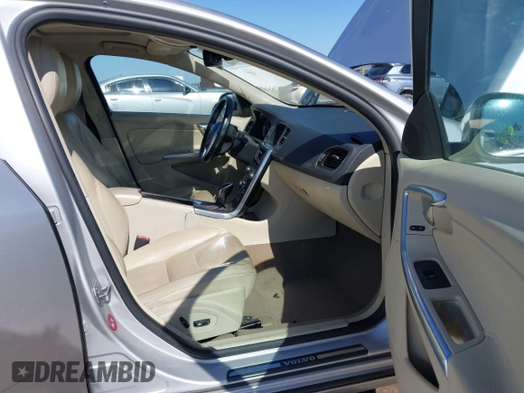 2014 Volvo S60 T5 z VIN YV1612FS3E2290445, wystawiony jako IAAI lot #41615450 z przebiegiem Nie podano mil oraz . Historia ofert i sprzedaży dostępna na DreamBid. Obrazek 5.